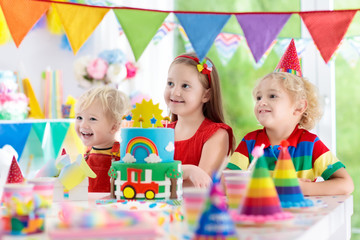 Fototapeta na wymiar Kids party. Birthday cake with candles for child.