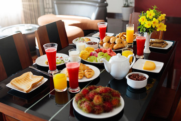 Healthy family breakfast. Fruit, bread, juice.