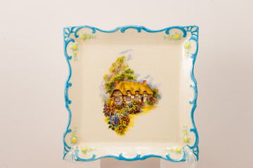 hand crafted square decorative plate with scalloped edge