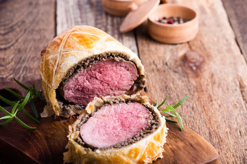 Beef Wellington, classic steak dish on cutting board