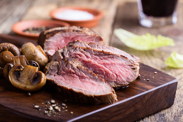 Roast beef steak with mushrooms