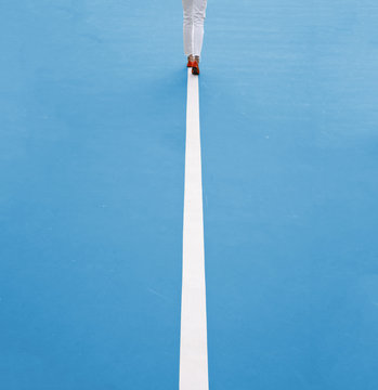 Woman walking along a straight line