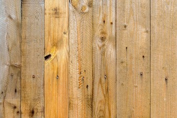 background from wooden boards with nails