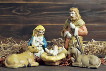 Christmas nativity scene with holy family - obrazy, fototapety, plakaty