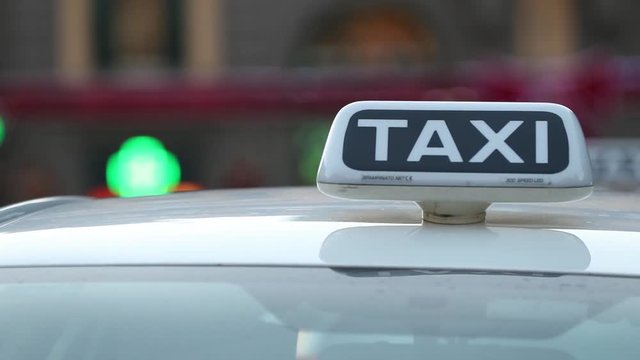 taxi or cab sign. detail. close up, slow motion
