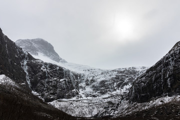Trollstigen with snow in april 2017. This serpentine mountain road in Rauma Municipality, More og Romsdal county, Norway is closed in winter.