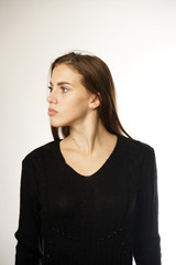 woman in a black sweater on a white background