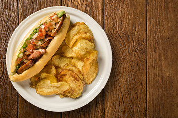 Pulled pork sandwiches with vinaigrette and chips potato