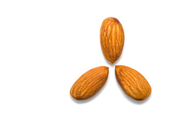 Group of almonds on white background