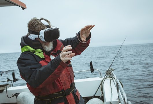 Fisherman using virtual reality headset