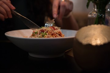 Mid section of person having food