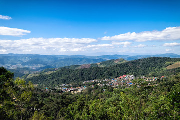 Beautiful landscape with village and mountain, they are producing some of the world's finest coffee at Doi Chang, Chiang Rai, Thailand
