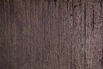 Obraz premium Natural brown clay earth wall background. Handmade soil texture