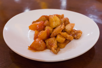 Chinese traditional pork dish in sour sweet sauce