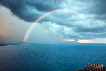 Storm on the sea with rainbow