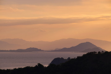 Scenic View Of Dramatic Sky During Sunset over the sea in Flores island, Labuan Bajo, Indonesia