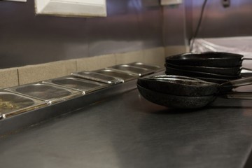 Empty pan on food station