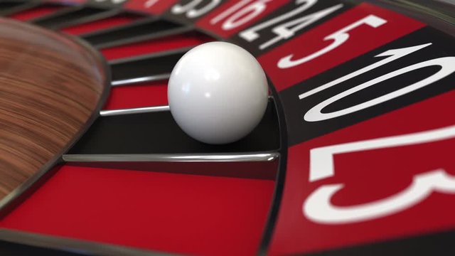 Casino roulette wheel ball hits 10 ten black
