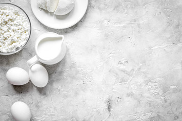 monochrome concept with dairy products on stone table top view m