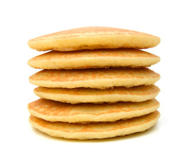 A stack of plain pancakes on a white background.