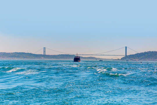 Large cargo container ship passing through Bosphorus, Istanbul, Turkey