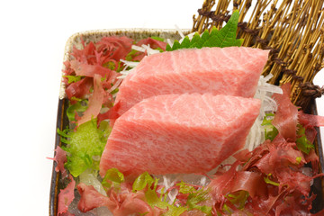 Close-up Otoro sashimi Slice in black bowl Japanese style on white background