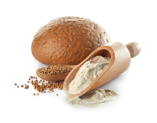Composition with buckwheat flour and fresh bread on white background