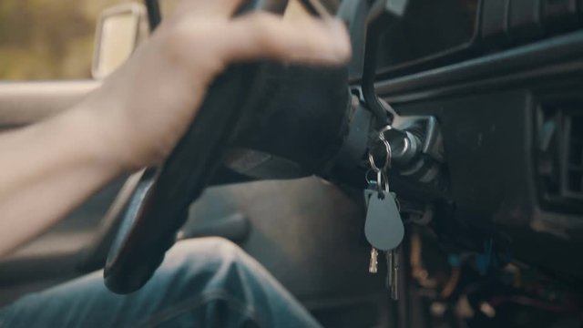 Old car's keys in ignition while driving