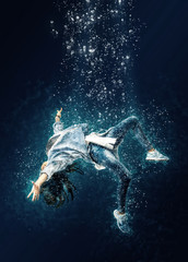 Woman floats underwater. Horrible dream