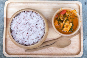 Portion of Thai panang curry with red rice