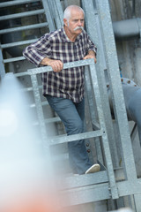 man observing at something