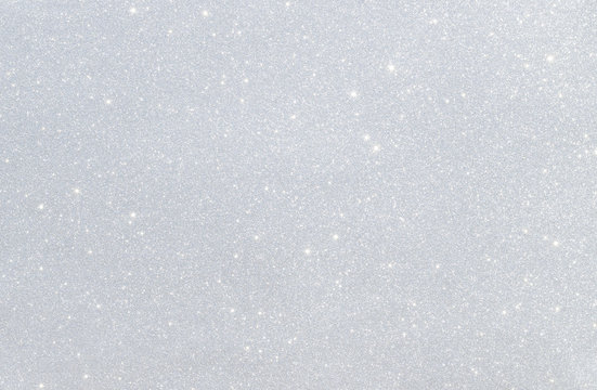 Gray background of shiny texture. Snow for Christmas card.