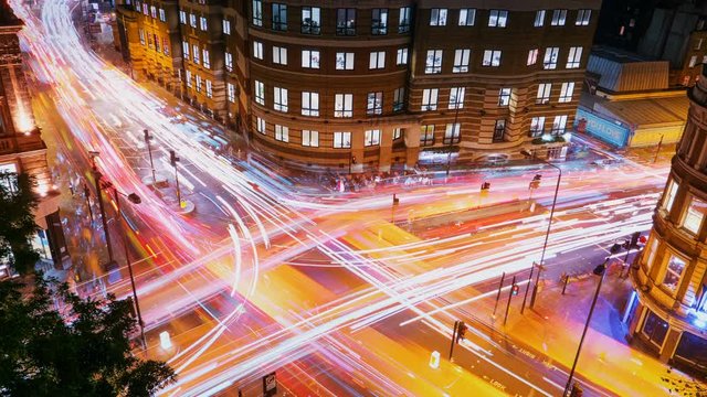 Wide angle aerial view of traffic trails on a busy juncture in London, England, UK