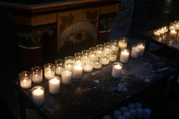 Votive candles in church