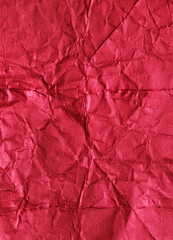 Fototapeta premium Crumpled red paper