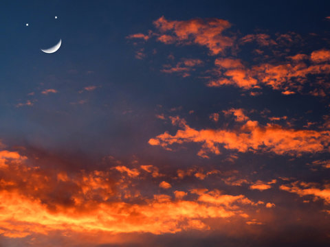 moon smile and dark cloud on twilight sky