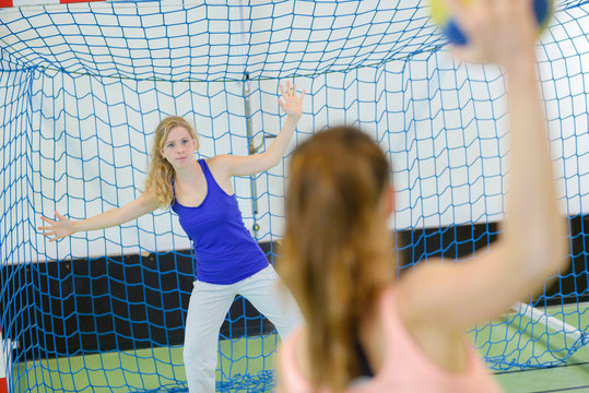 Woman defending handball goal