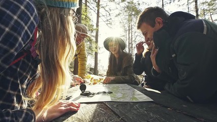 Tourist pointing on the world map for planning journey