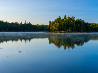 Fototapeta na wymiar Vermont Lake, Mist over Water, Forest, Green Mountains