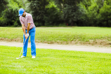 Golfer practicing and concentrating before and after shot