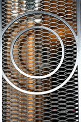Decorative oval small metal mesh. Wicket with round ornaments