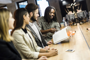 Group of people discussing the contents of the article