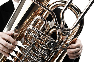 Naklejka premium Tuba brass instrument. Wind musical instruments
