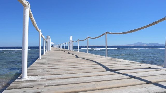 Pontoon bridge on the Red Sea. Scenic seascape .