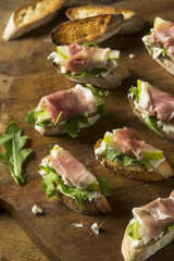 Homemade Prosciutto Pear Cheese Crostini