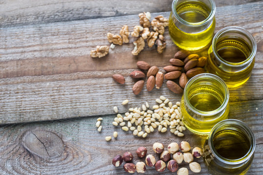 Glass Jars With Different Kinds Of Nut Oil