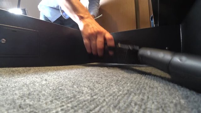 someone opens a safe with weapons and money 4k, close-up