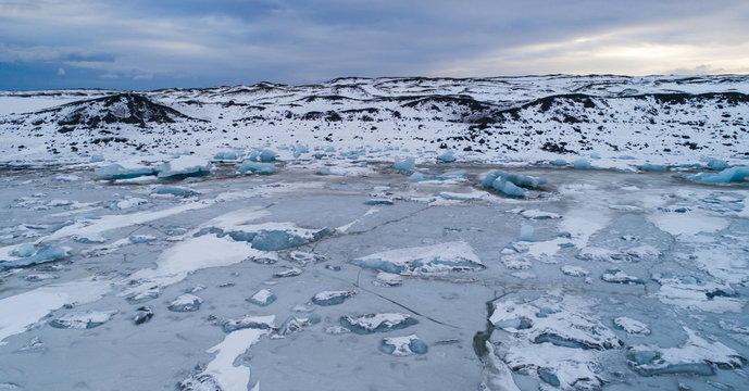 Frozen lagoon with icebergs, aerial photo, Fjallsárlón Iceland