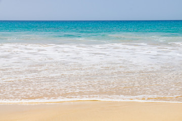 Fototapeta na wymiar Waves breaking on Santa Monica Beach, Boa Vista, Cape Verde