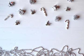 Christmas wooden background with attributes of New Year and Christmas Day. Cute background for card. Merry Christmas and Happy New Year. Minimalism background.